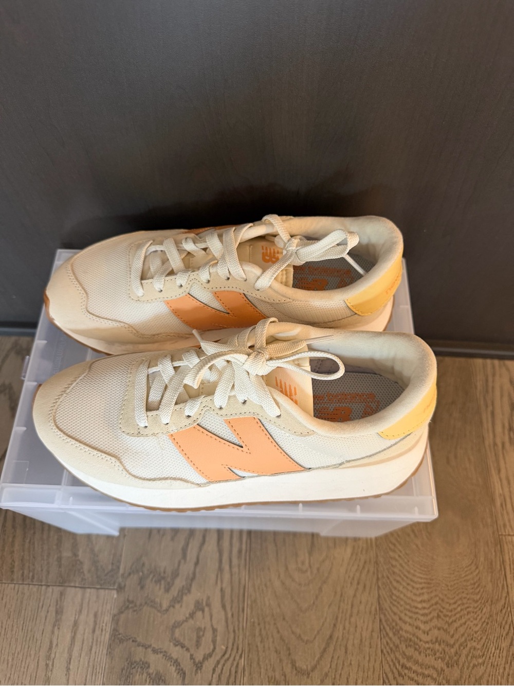 New Balance Women's Cream Sneakers with Peach and Yellow Accents
